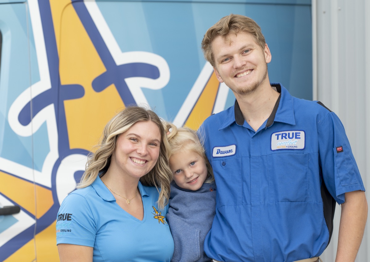 True Comfort team members with the next generation of the family